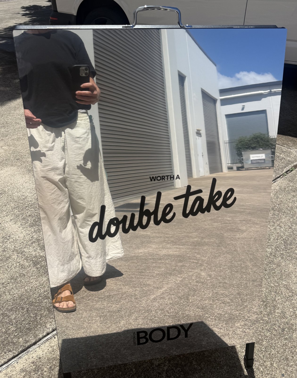 Mirror finish A-frame footpath sign with black cut vinyl lettering, Sykes Signs Coolum Beach