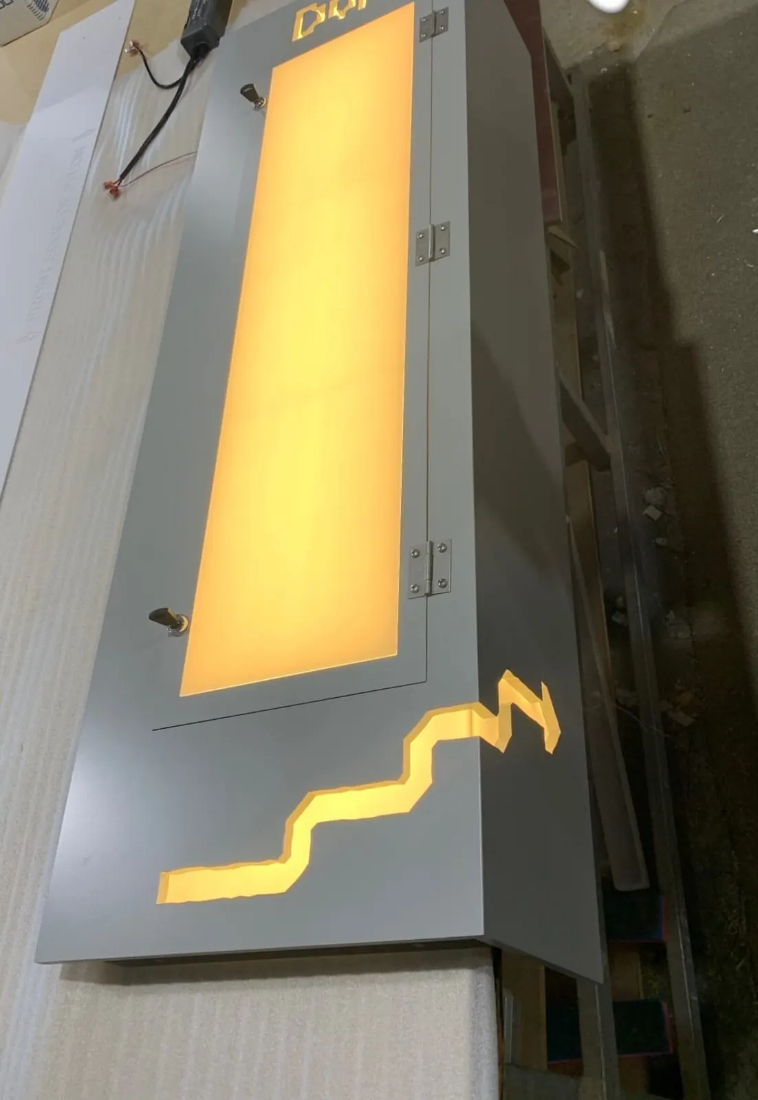 Doña illuminated light box sign with laser cut logo, made by Sykes Signs
