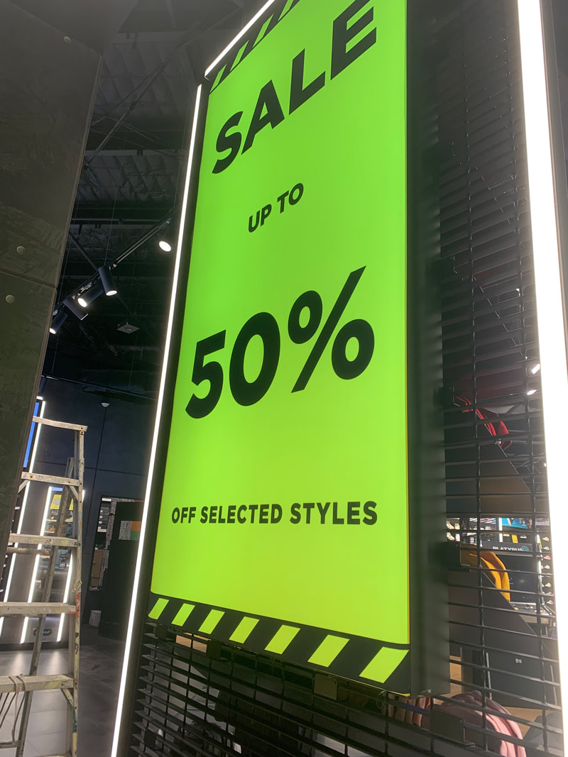 Event graphics — Printed promo set by Sykes Signs