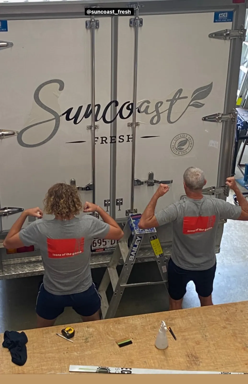 Sykes Signs team after installing Suncoast Fresh truck signage