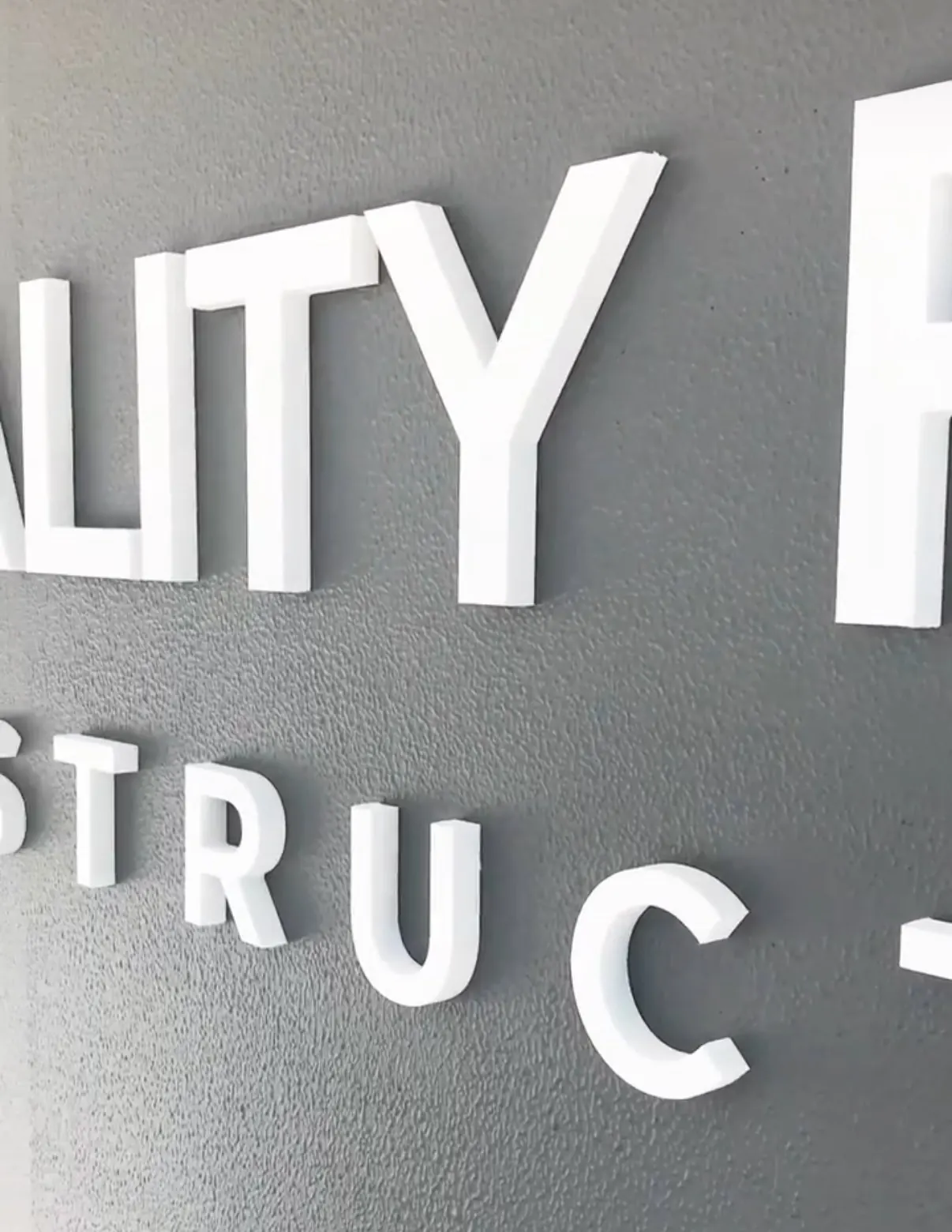 White 3D letters for a construction company office by Sykes Signs