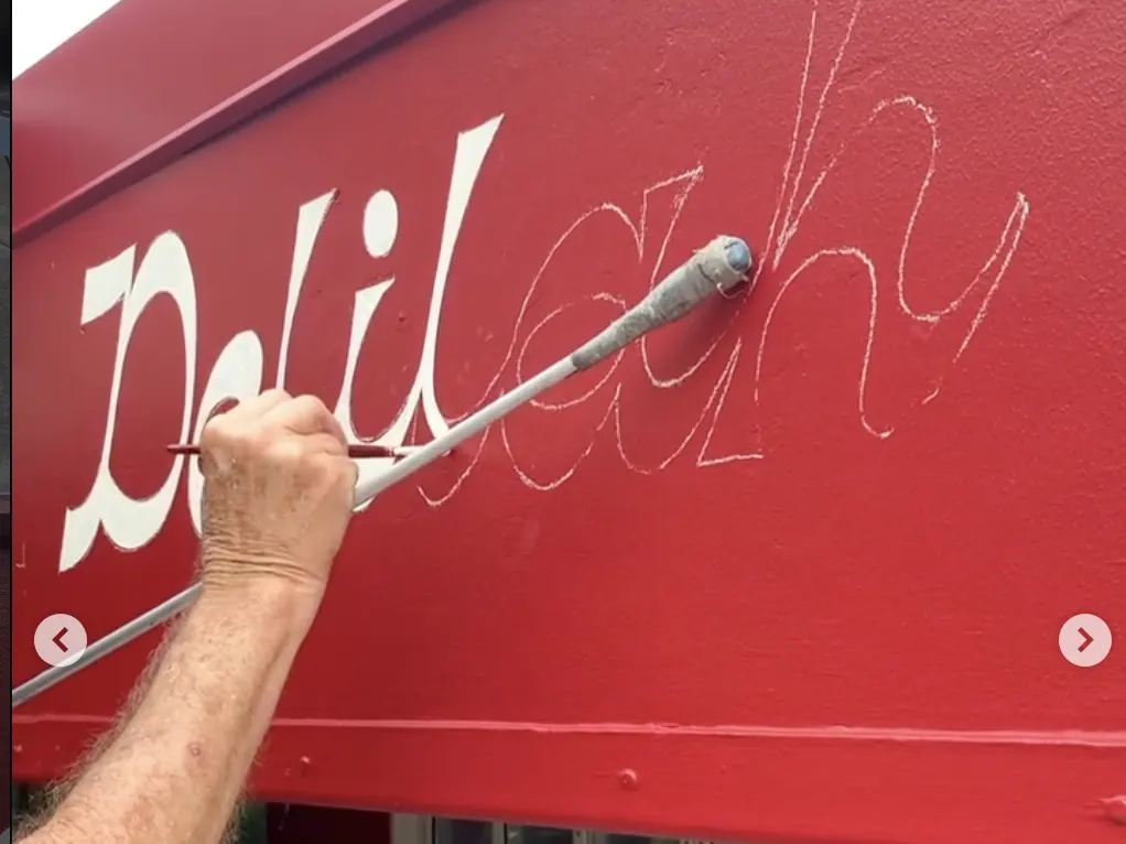 Delilah — hand-painted fascia by Sykes Signs, Peregian Beach