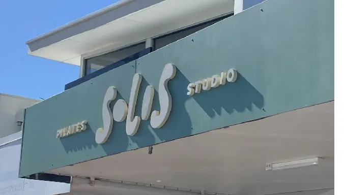 Solis Pilates — Raised acrylic script by Sykes Signs